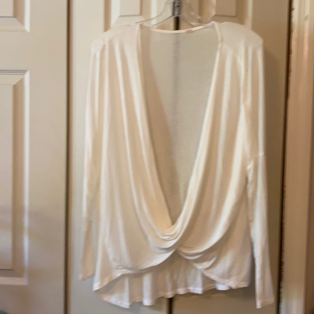 Oversized flowy cream top with open front